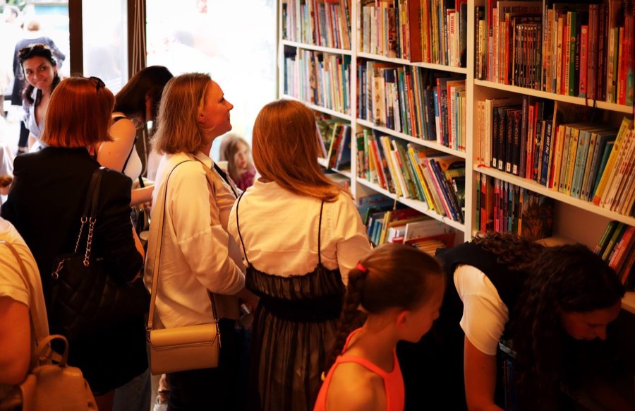 Guests at the AzbookA bookshelves